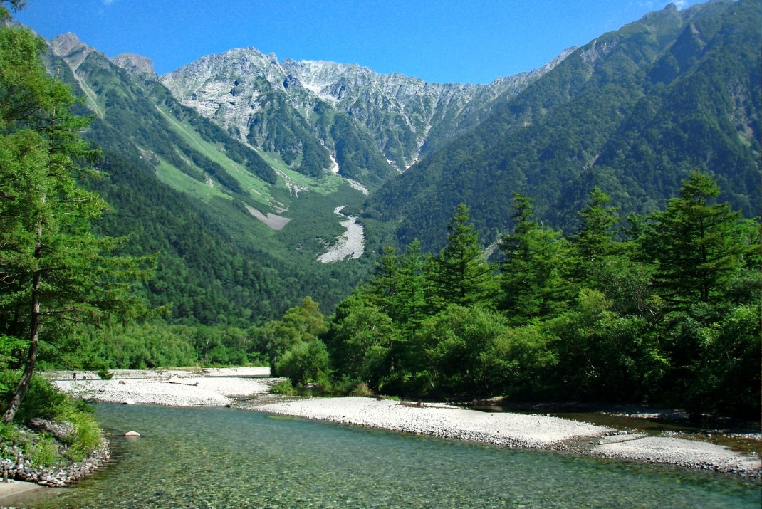 Scenic view of Kamikochi in the Northern Japan Alps, with trails along the Azusa River and native Japanese macaques ,during a Travellers Autobarn campervan road trip