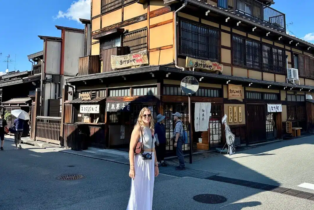 Traveler exploring the historic wooden streets of Hida-Takayama in Gifu